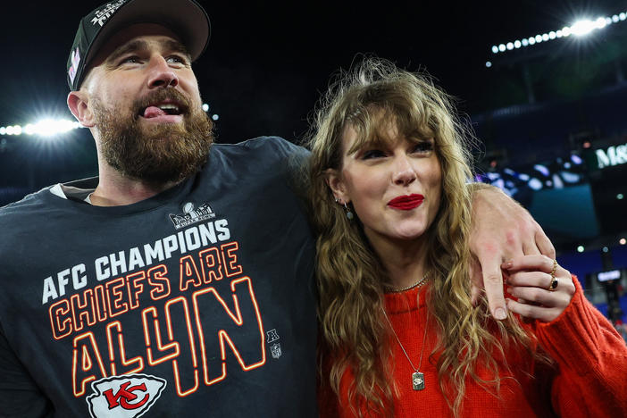 Travis Kelce and Taylor Swift celebrate after the Kansas City Chiefs defeated the Baltimore Ravens in the AFC Championship Game at M&T Bank Stadium in Maryland on Sunday.