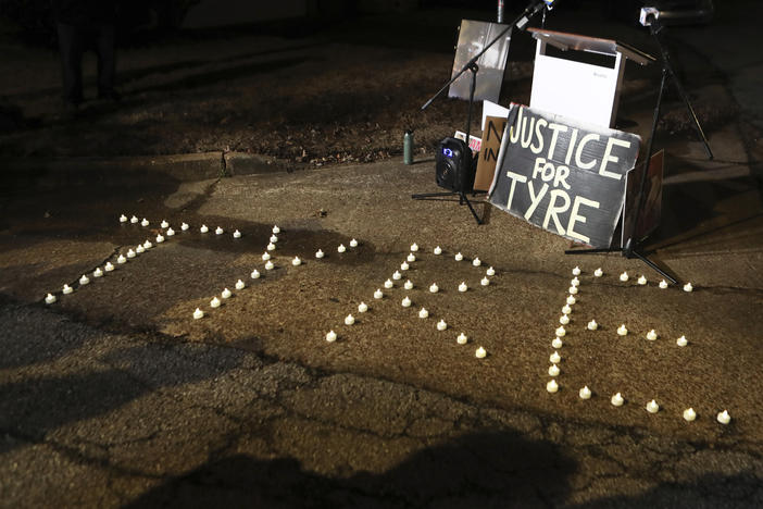 Candles spell out the name of Tyre Nichols during a candlelight vigil on the anniversary of his death, Jan. 7, 2024, in Memphis, Tenn.