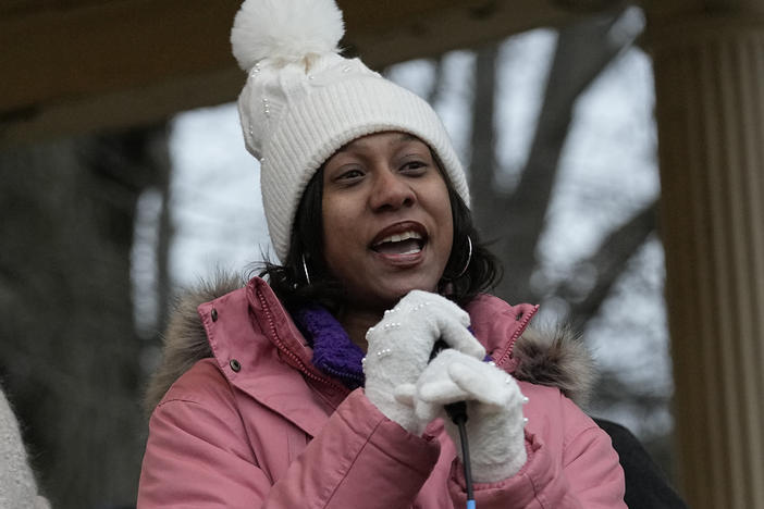 Brittany Watts, center, speaks to a rally of supporters, Thursday, Jan. 11, 2024, in Warren, Ohio. A grand jury decided that Watts, who was facing criminal charges for her handling of a home miscarriage, will not be charged. Congressional Democrats are using Watts' case to call for Biden to do more on abortion rights and protection for pregnant patients.