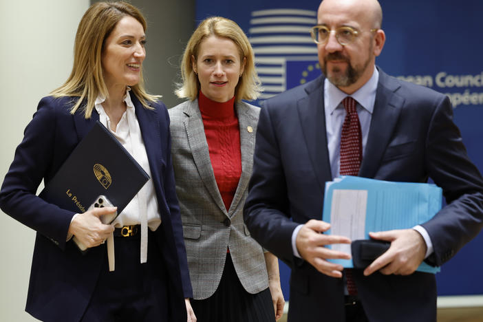 From left, European Parliament President Roberta Metsola, Estonia's Prime Minister Kaja Kallas and European Council President Charles Michel arrive to a round table meeting at an EU summit in Brussels, Thursday. "Ukraine is our priority and this agreement will give the credibility, legitimacy and the predictability that is expected from us," Metsola said.