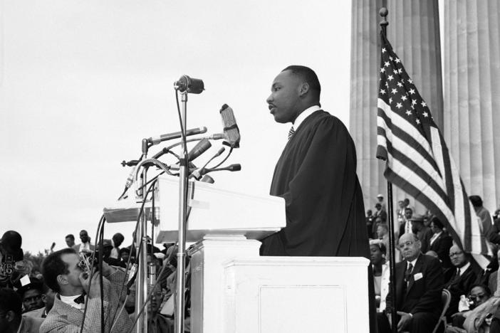 King speaks at a mass demonstration at the Lincoln Memorial in Washington, D.C., on May 17, 1957, as civil rights leaders called on the U.S. government to put more teeth into the Supreme Court's desegregation decisions.