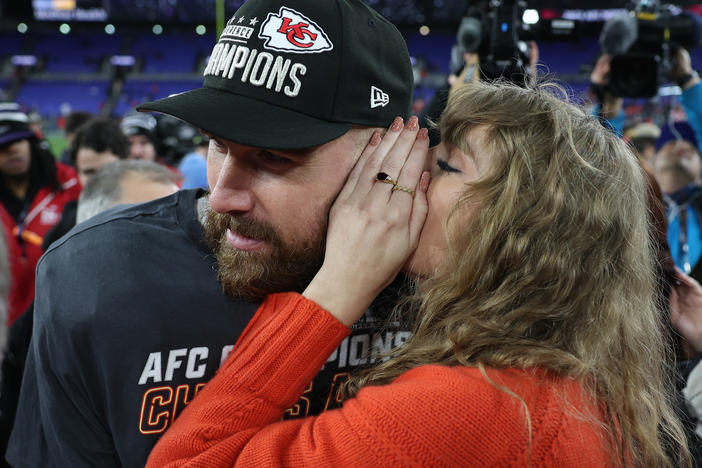 Travis Kelce of the Kansas City Chiefs celebrates with Taylor Swift after a 17-10 victory against the Baltimore Ravens in the AFC Championship Game on Jan. 28, 2024 in Baltimore.