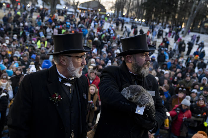 Punxsutawney Groundhog Club President Tom Dunkel and groundhog handler AJ Derume with Punxsutawney Phil, at last year's annual Groundhog Day festivities in Punxsutawney, Pa.