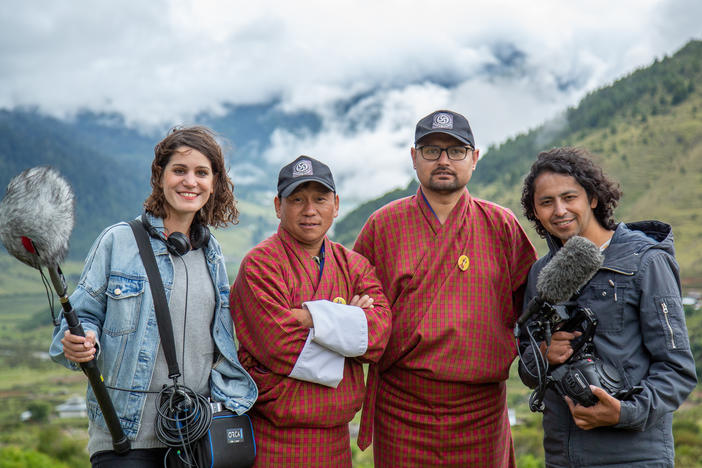 The new documentary <em>Agent of Happiness</em> follows Bhutanese bureaucrats who survey people about their state of mind. From right: director Dorottya Zurbó, happiness agents Amber Kumar Gurung and Guna Raj Kuikel, and director Arun Bhattarai.