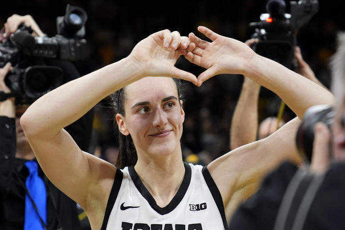 Iowa guard Caitlin Clark celebrates as she walks off the court after an NCAA college basketball game against Nebraska on Jan. 27.