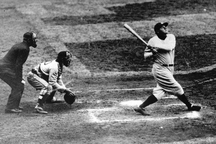 New York Yankees' Babe Ruth hits a baseball in this undated photo.