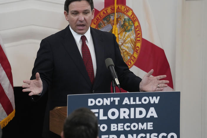 Florida Gov. Ron DeSantis speaks Monday in Miami Beach, Fla. backing legislation that would ban homeless camps on public property except for designated areas.