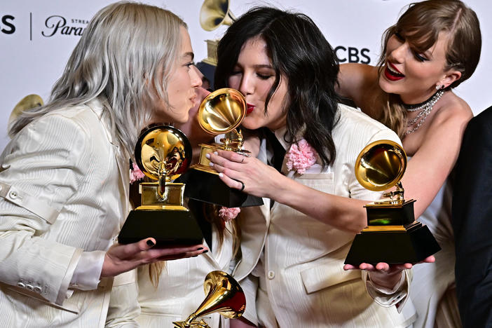 Taylor Swift poses with Julien Baker, Phoebe Bridgers and Lucy Dacus of boygenius after the 66th annual Grammy Awards.