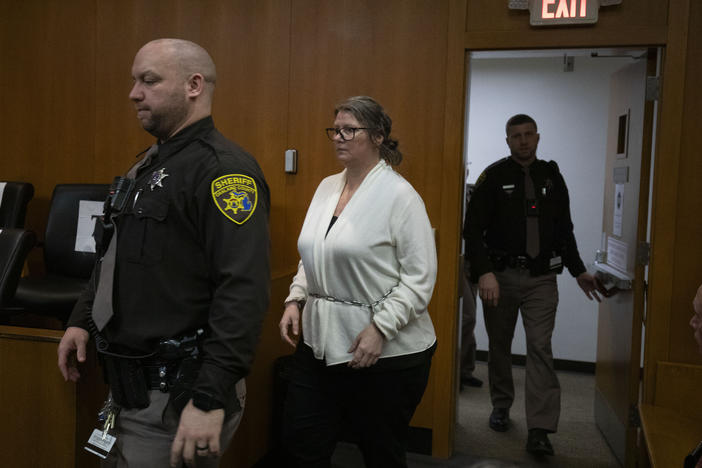 Jennifer Crumbley, the mother of Oxford school shooter Ethan Crumbley, enters the courtroom in Oakland County Circuit Court on Monday  in Pontiac, Mich.