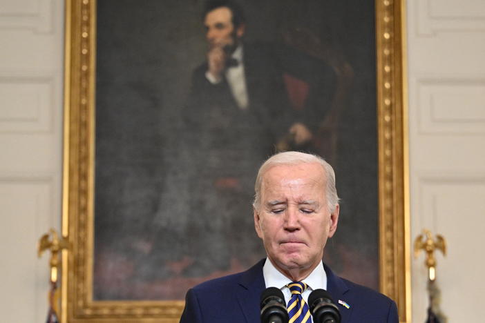 President Biden pauses in remarks in the State Dining Room on Feb. 6. Biden urged Congress to pass a Senate compromise bill with funding for the border, Ukraine and other national security priorities.