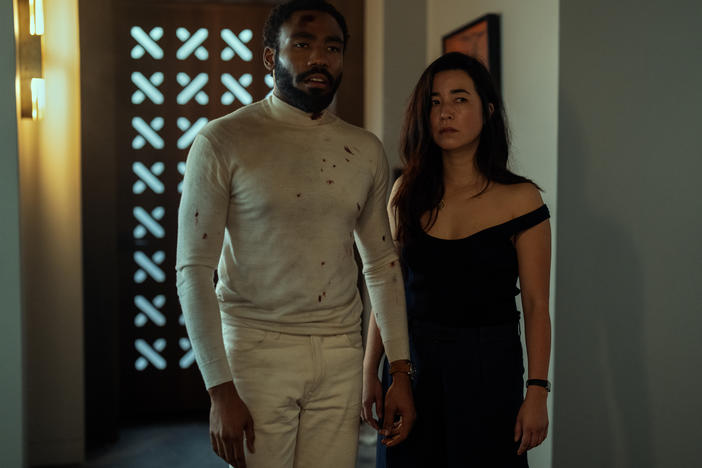 Donald Glover and Maya Erskine star in <em>Mr. & Mrs. Smith</em>.