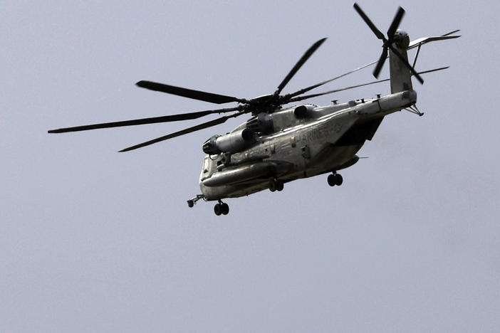 A Marine CH-53E Super Stallion helicopter flies during training at Marine Corps Air Station Miramar in San Diego on Tuesday. A Marine Corps helicopter, like the one pictured, that had been missing with five troops aboard was found Wednesday morning in a mountainous area outside San Diego.