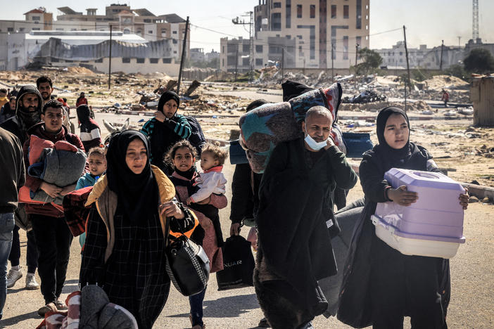 Displaced Palestinians flee from Khan Younis in the southern Gaza Strip on Jan. 30.