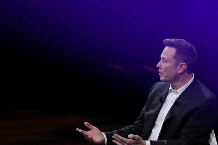 Tesla CEO Elon Musk speaks at a conference in Paris on June 16, 2023. Musk's record compensation package as Tesla CEO was recently rejected by a court as excessive, in a decision that pivoted in part on how much sway Musk has over his company.