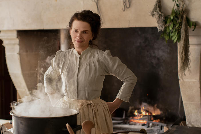 Juliette Binoche prepares one elaborate dish after another in <em>The Taste of Things.</em>