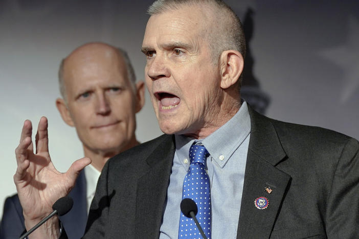 Rep. Matt Rosendale, R-Mont., right, speaks during a news conference on Capitol Hill on Jan. 10, 2024.