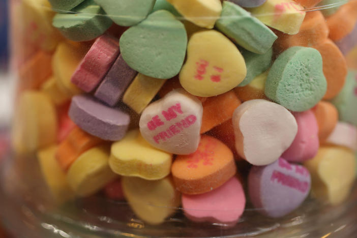 Candy hearts are displayed on a shelf in Wilton Manors, Fla., in 2019. If you want to avoid processed, high-sugar candy, consider healthier alternatives for your loved one this year.