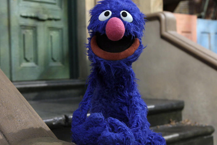 Grover, pictured on "Sesame Street" in 2011, announced on Monday that one of his many jobs is in journalism. The social media response underscored the precarious state of the industry.