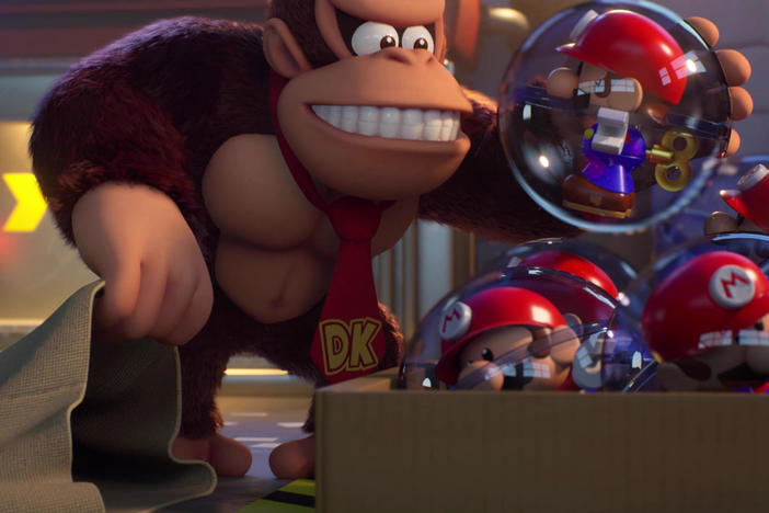 Donkey Kong, possessed by a consumerist frenzy for Mini-Mario toys.