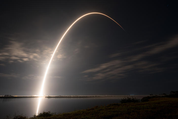 An undated photo shows a SpaceX Falcon 9 rocket carrying Starlink communications satellites into orbit. The Starlink constellation is made up of thousands of satellites that are difficult for adversaries to target.