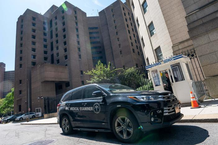 A New York Medical Examiner's car is parked outside the Metropolitan Correctional Center where financier Jeffrey Epstein was being held in New York. Epstein committed suicide in prison.