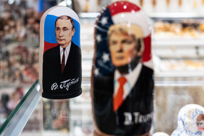 A souvenir shopkeeper displays Matryoshka dolls featuring Russian President Vladimir Putin and former US presidents, including Donald Trump in Moscow.  In recent years the one-time party of Reagan and current party of Trump has shown an increasing admiration of Russia and Vladimir Putin.
