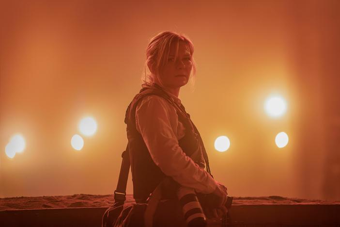 <em>Civil War</em> imagines a second civil war has broken out in the United States. Kirsten Dunst stars as a journalist in the film, which comes out April 12.