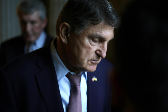 Sen. Joe Manchin, D-W.Va., leaves the Senate chamber after a live quorum call at the U.S. Capitol this week.