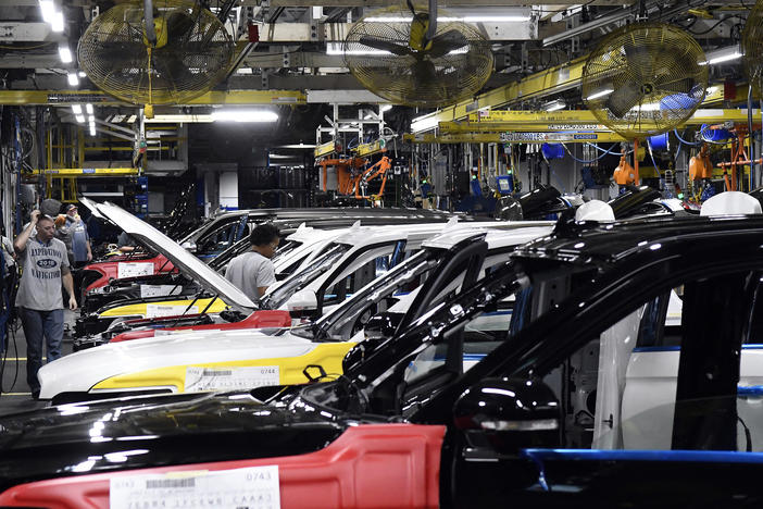 In this file photo, workers assemble Ford trucks at the Ford Kentucky Truck Plant on Oct. 27, 2017, in Louisville, Ky.