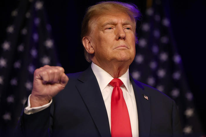 Former President Donald Trump greets supporters at his caucus night watch party at the Treasure Island Hotel & Casino on Feb. 8 in Las Vegas.