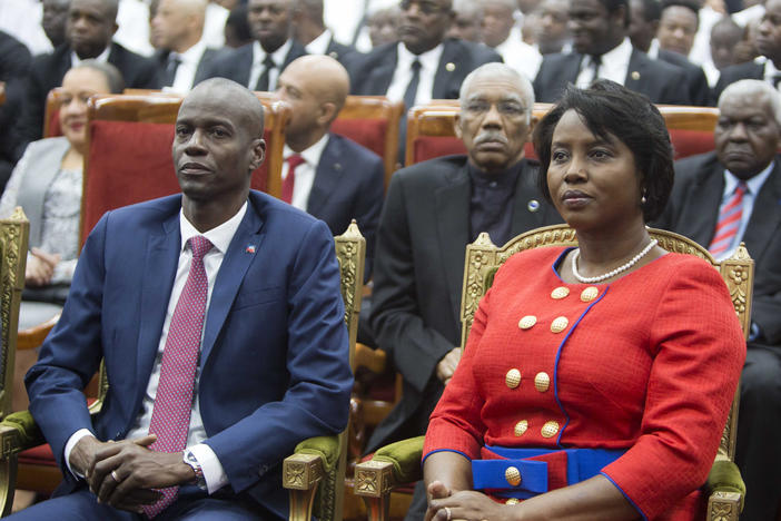 Haiti's President Jovenel Moise sits with his wife Martine during his swearing-in ceremony at Parliament in Port-au-Prince, Haiti, Tuesday Feb. 7, 2017. A judge investigating the July 2021 assassination of President Moïse issued a final report that indicts his widow, ex-prime minister Claude Joseph and the former chief of Haiti's National Police, Léon Charles, among others.