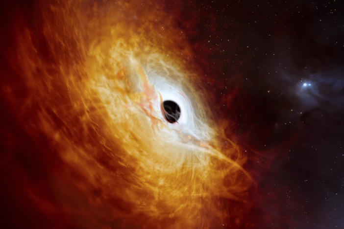 This illustration provided by the European Southern Observatory this month depicts the record-breaking quasar J059-4351, the bright core of a distant galaxy that is powered by a supermassive black hole.