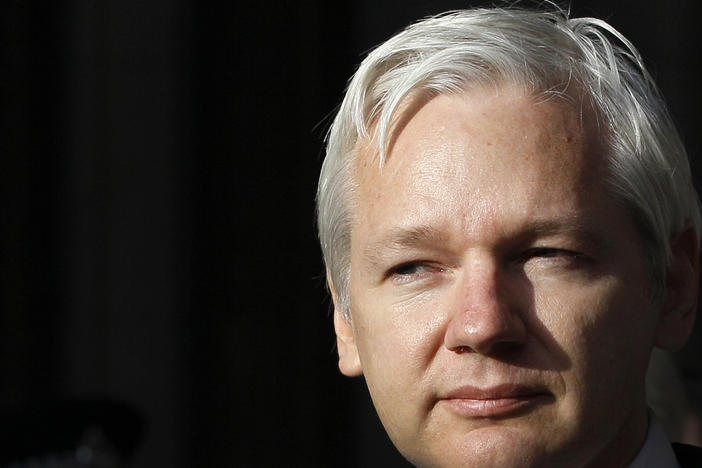 WikiLeaks founder Julian Assange is shown making a statement to the media gathered outside the High Court in London, Dec. 5, 2011.