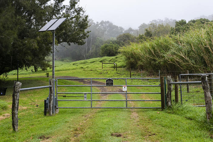 The gate to a large property in Waimea. Median home prices in the area are up 87% from pre-pandemic prices.