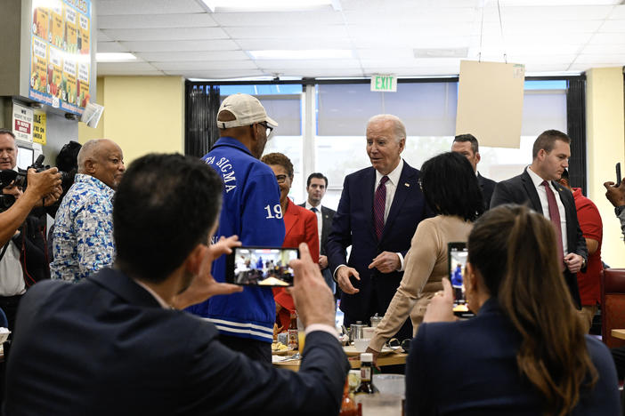 President Biden greets people at CJ's Cafe in Los Angeles, Calif., on Feb. 21, 2024.