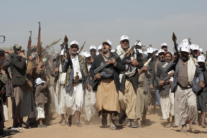 Houthi fighters march during a rally of support for Palestinians in the Gaza Strip and against the U.S. strikes on Yemen, outside Sanaa, on Jan. 22.