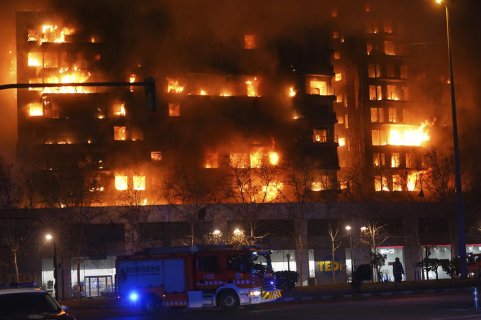 A housing block burns in Valencia, Spain, on Thursday.
