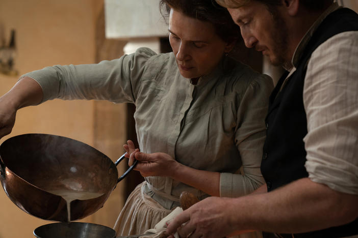 Eugénie (Juliette Binoche) and Dodin Bouffant (Benoît Magimel) in <em>The Taste of Things</em>.