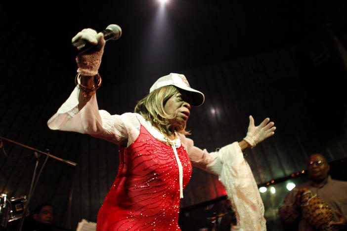 Cuban singer-entertainer Juana Bacallao performs at the "One-Eyed Cat" cafe in Havana in 2010.