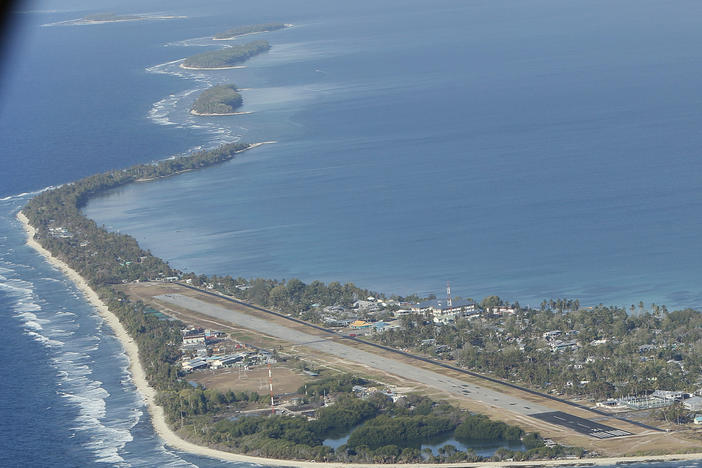 Funafuti, the main island of the nation state of Tuvalu, is photographed from a Royal New Zealand Air Force C130 aircraft as it approaches the tiny South Pacific nation.