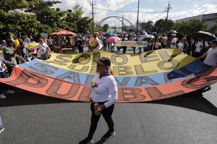 People take part in a rally in support of Colombian President Gustavo Petro in Medellín, Colombia, on Feb. 8.