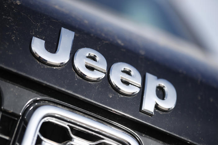 The Jeep logo is seen in the south Denver suburb of Englewood, Colo., on April 15, 2018. Chrysler is recalling more than 330,00 Jeep Grand Cherokees because of a steering wheel issue that may cause drivers to lose control of their vehicles.