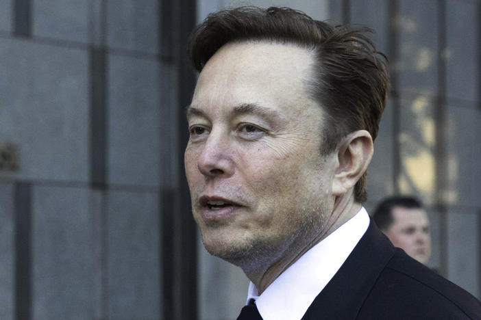 Elon Musk departs the Phillip Burton Federal Building and United States Court House in San Francisco, on Tuesday, Jan. 24, 2023.