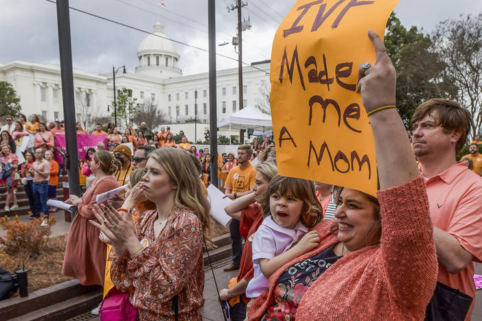 Hundreds gather for a protest rally in support of in vitro fertilization legislation on Wednesday in Montgomery, Ala.