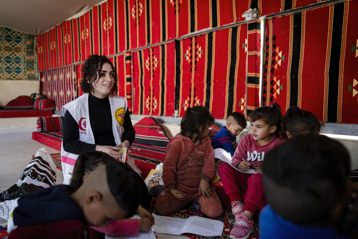 Psychologist Redah Hussin leads an art therapy class for Bedouin children. Between an uptick in settler violence and the war in Gaza, Palestinians are dealing with multiple mental health stressors.