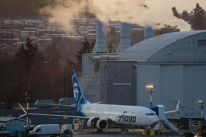 Boeing workers at the Renton Municipal Airport in Washington finalize assembly of an Alaska Airlines Boeing 737 Max jet on Feb. 27. An FAA audit faulted Boeing for "multiple instances" of quality control shortcomings.