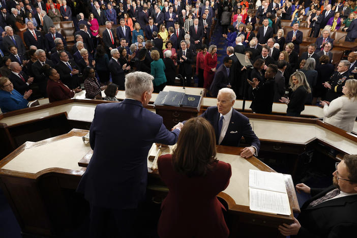 President Biden arrives and greets House Speaker Kevin McCarthy as Vice President Kamala Harris looks on, ahead of the State of the Union speech last year.