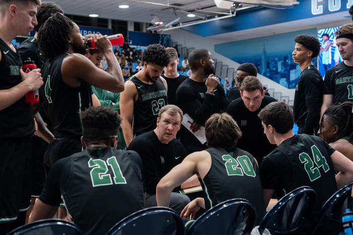 Dartmouth Big Green gather for a team talk during their game against Columbia Lions in their NCAA men's basketball game on February 16, 2024 in New York City.