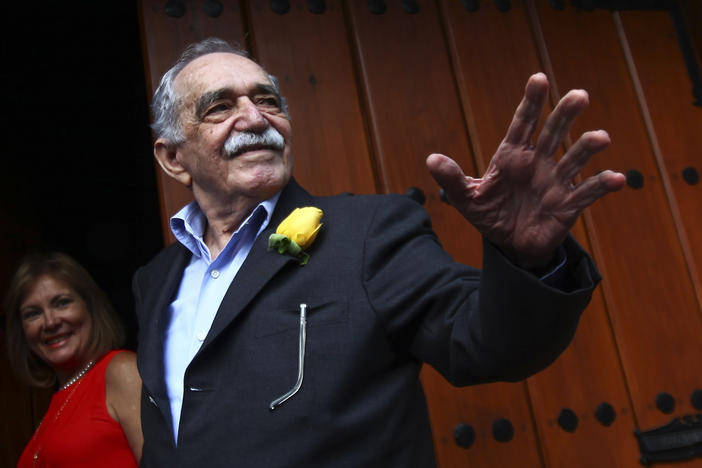 Gabriel García Márquez greets journalists and neighbors on his birthday outside his house in Mexico City on March 6, 2014.