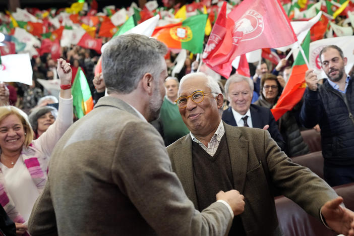 Socialist Party leader Pedro Nuno Santos, left, greets Portuguese Prime Minister Antonio Costa as he arrives for an election campaign rally in Lisbon, March 5, 2024.